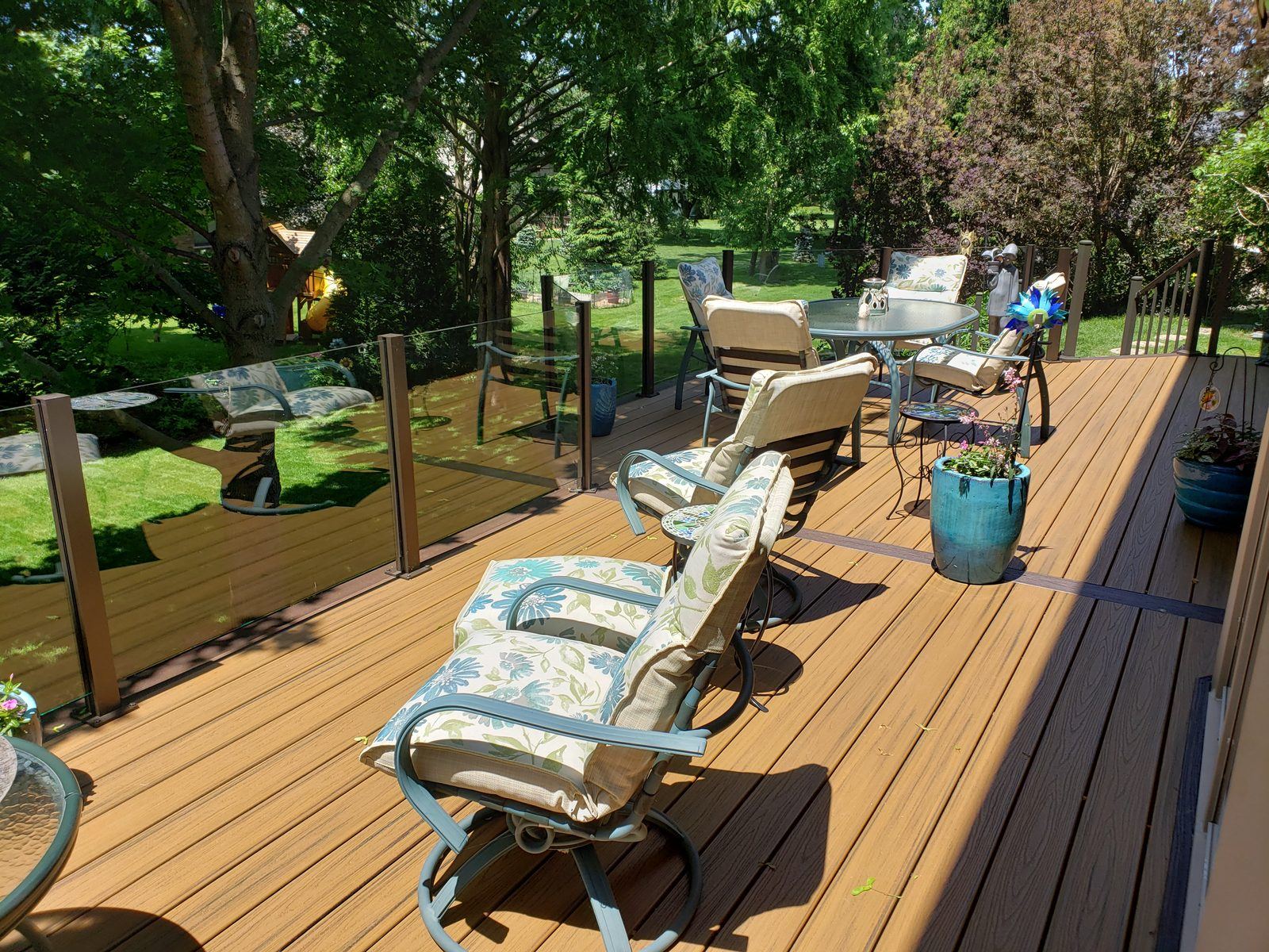 Falcon Topless Glass Rails — real project photo by Supreme Deck Builders, Southeast Michigan