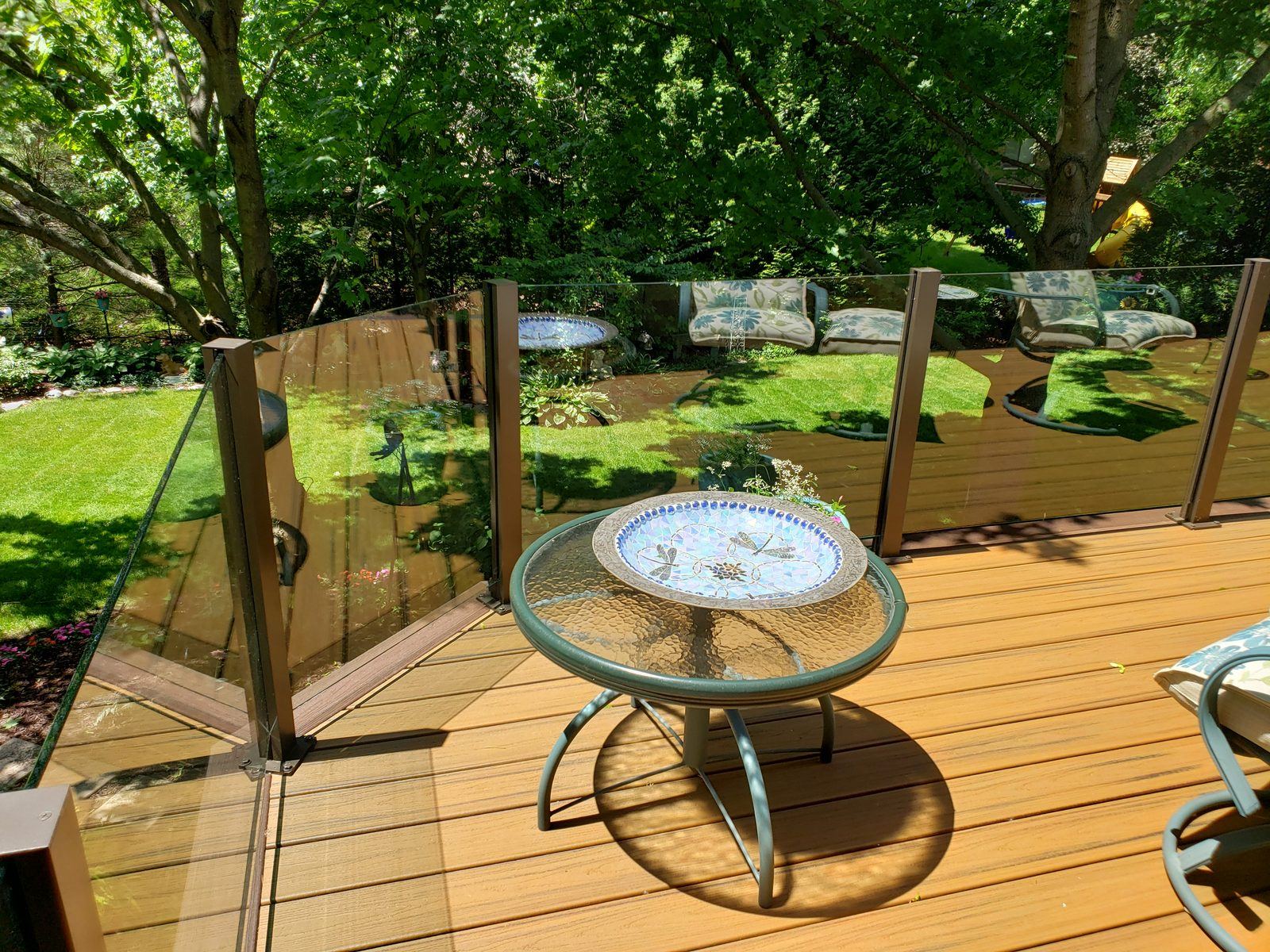 Falcon Topless Glass Rails — real project photo by Supreme Deck Builders, Southeast Michigan