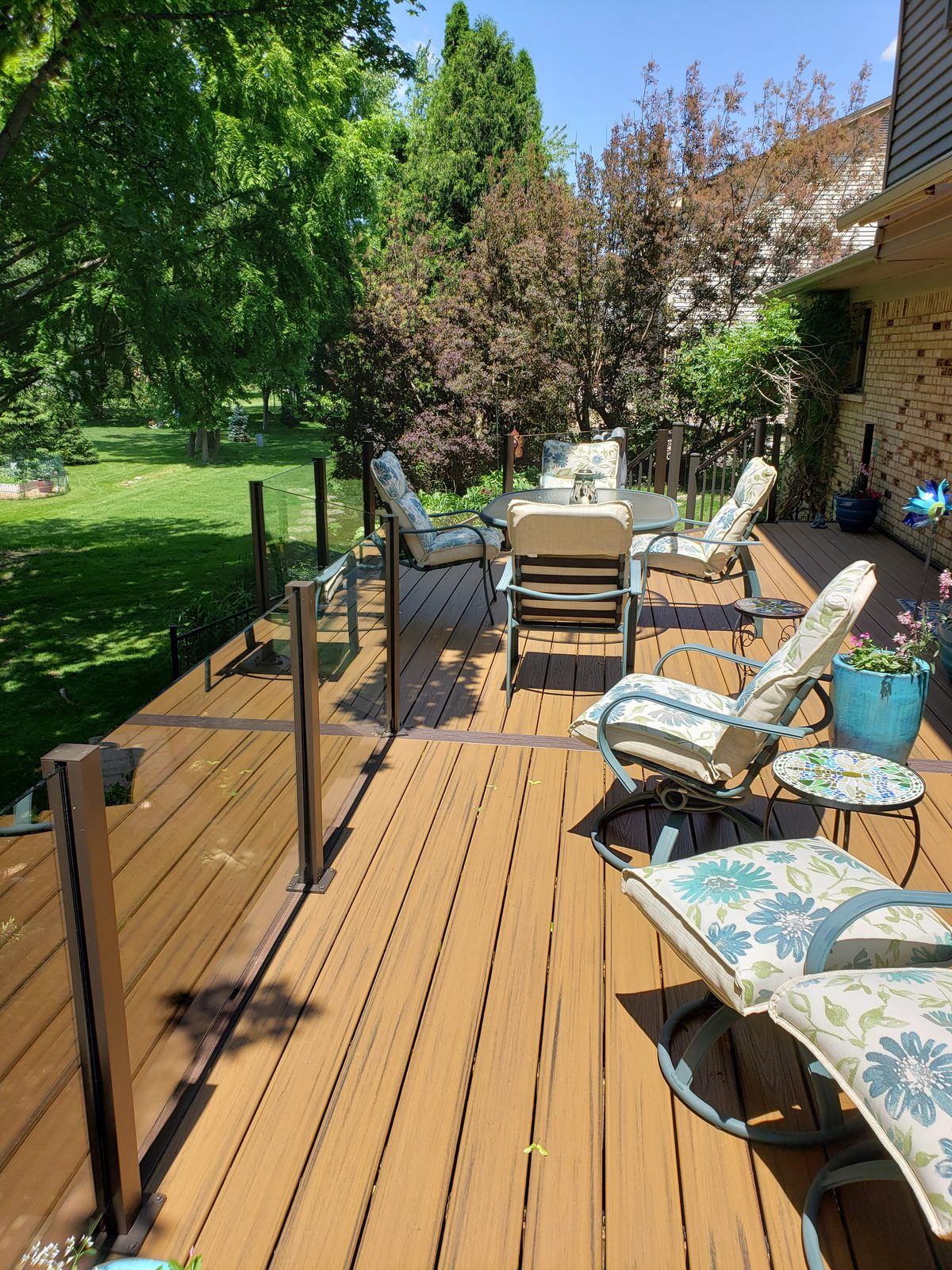 Falcon Topless Glass Rails — real project photo by Supreme Deck Builders, Southeast Michigan