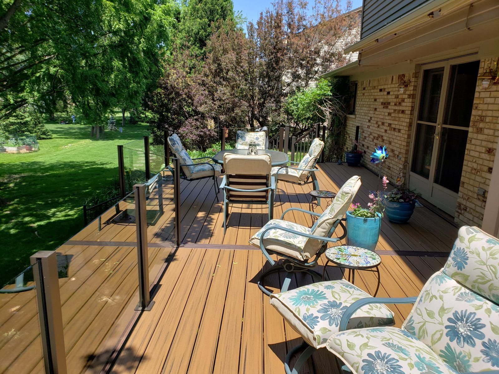 Falcon Topless Glass Rails — real project photo by Supreme Deck Builders, Southeast Michigan