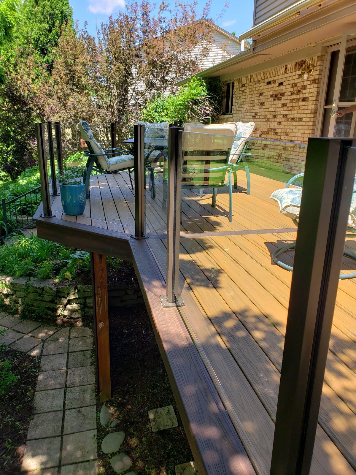Falcon Topless Glass Rails — real project photo by Supreme Deck Builders, Southeast Michigan