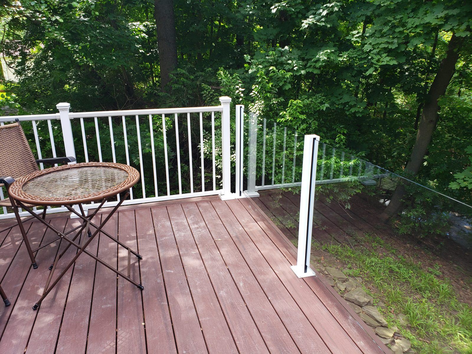 Falcon Topless Glass Rails — real project photo by Supreme Deck Builders, Southeast Michigan