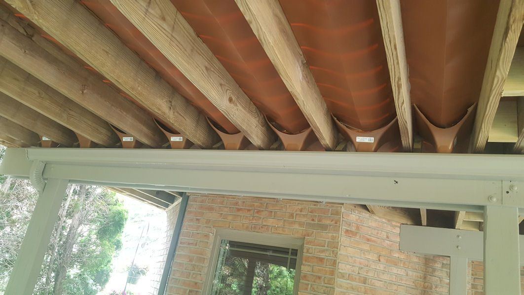 Trex Rain Escape — real project photo by Supreme Deck Builders, Southeast Michigan