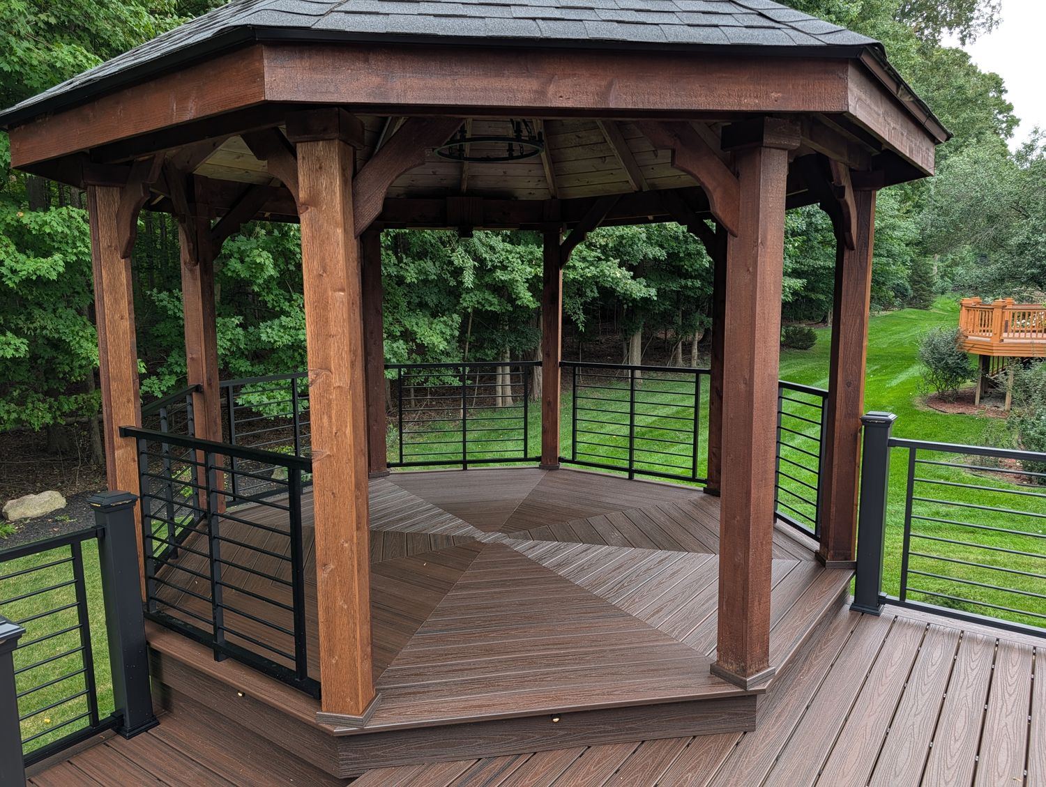 Trex Lava Rock deck with built-in gazebo and Trex Signature rod railing