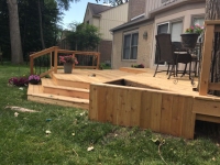 How long before you stain a cedar deck