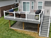 Rocky-harbor-with-White-Trandscend-rails-black-balusters